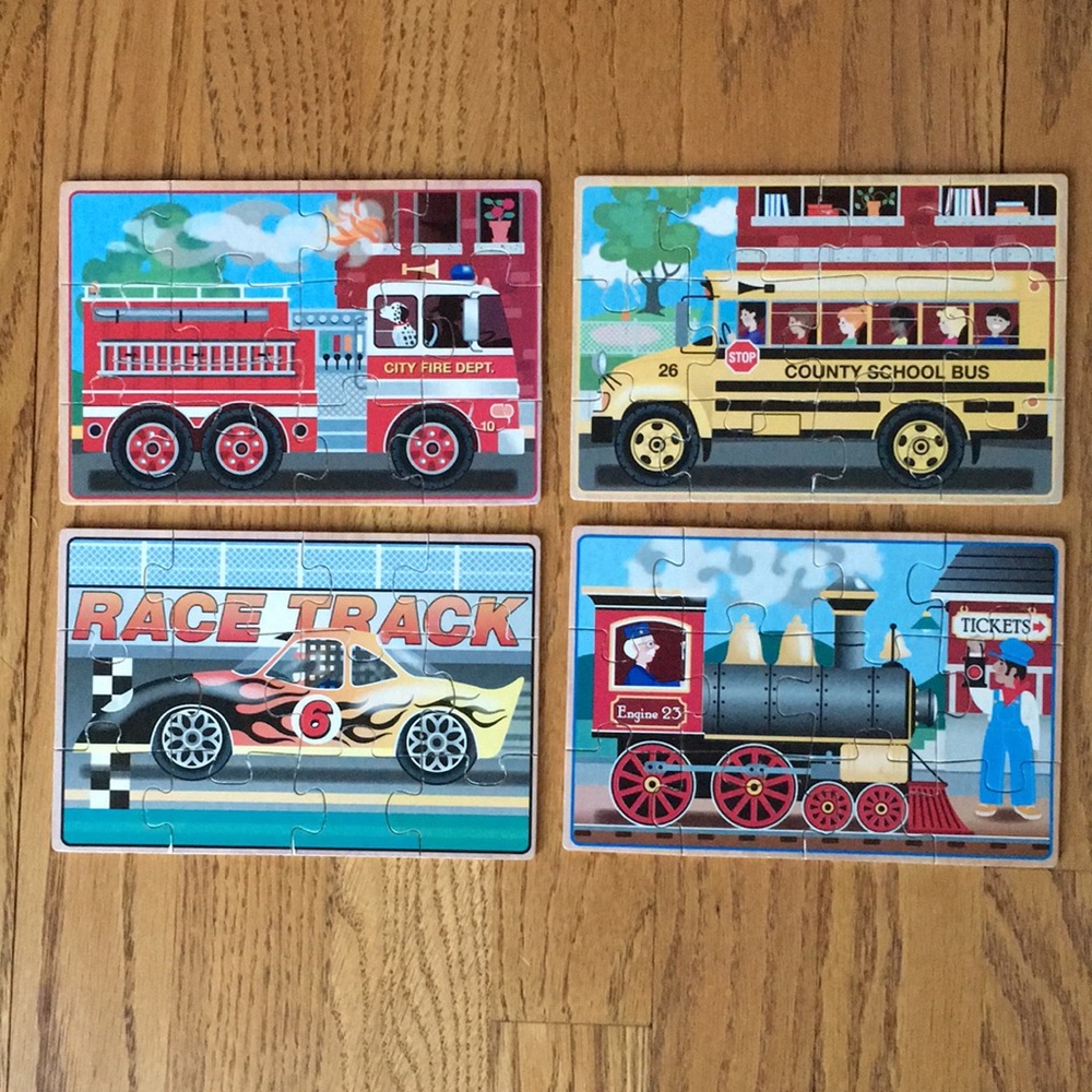 Melissa & Doug Vehicles 4-in-1 Wooden Jigsaw Puzzles in a storage Box